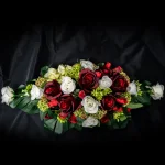 Bloemen Steve De Saedeleer 75€ rood-wit